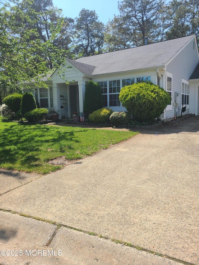 1207A Thornbury Ln Unit A, Manchester, NJ 08759 - view of front of property featuring a front yard and driveway