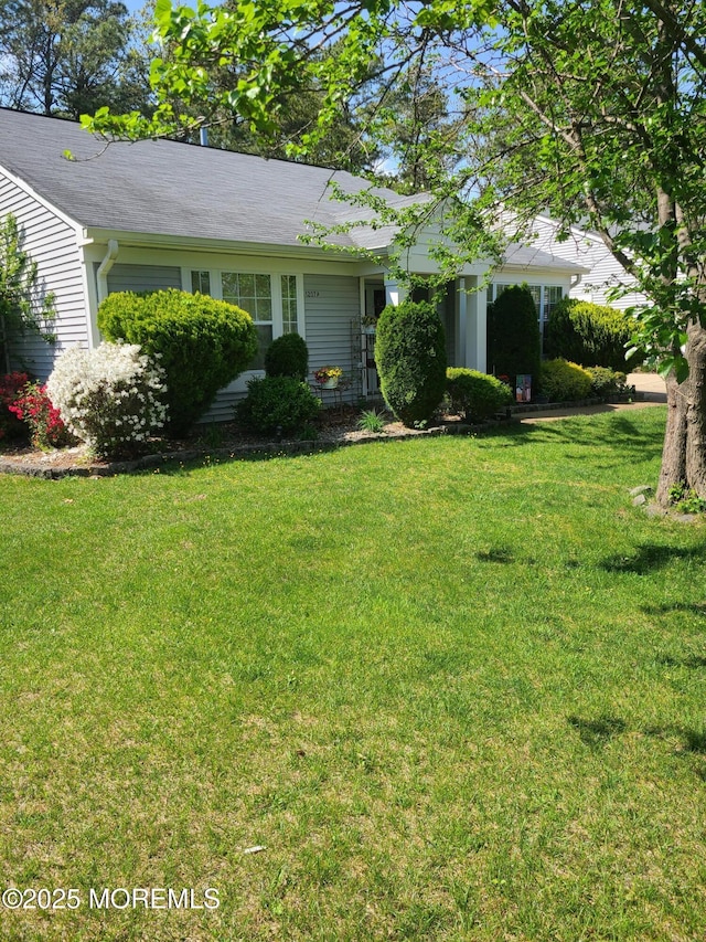 1207A Thornbury Ln Unit A, Manchester, NJ 08759 - view of front of house with a front yard