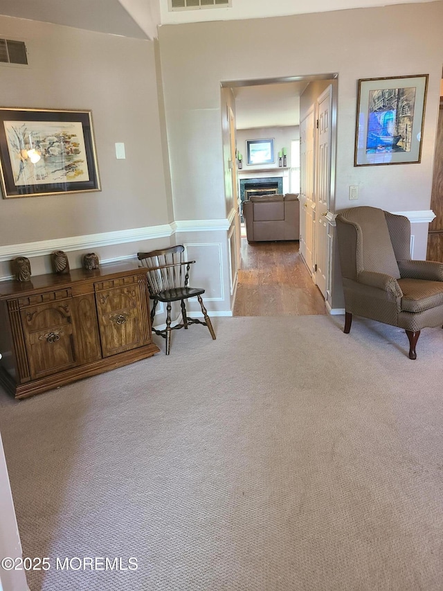 1207A Thornbury Ln Unit A, Manchester, NJ 08759 - hallway with carpet flooring and a wainscoted wall