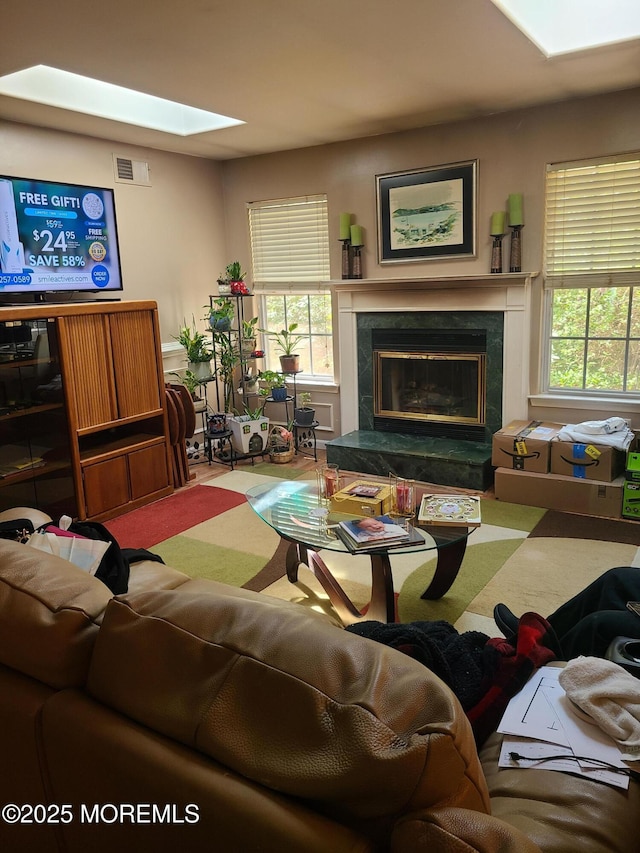 1207A Thornbury Ln Unit A, Manchester, NJ 08759 - living room with a skylight and a fireplace