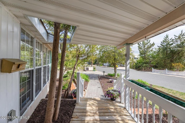 wooden deck with a porch
