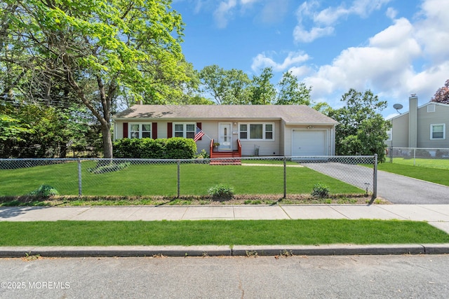 single story home featuring a garage and driveway