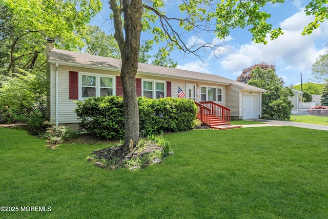 ranch-style home featuring driveway, an attached garage, a front yard, and a chimney