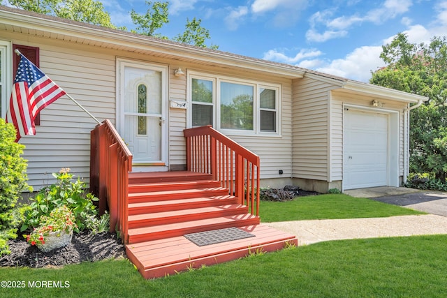 view of front of home with asphalt driveway, a front yard, and an attached garage
