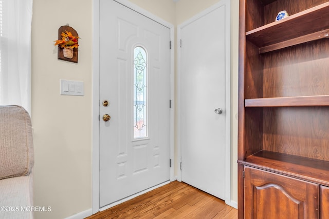 foyer featuring light wood-style floors