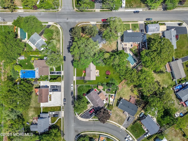aerial overview of property's location featuring nearby suburban area