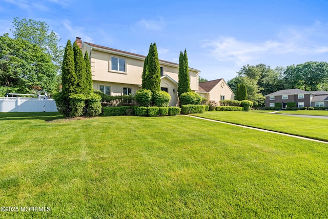 16 Bridle Dr, West Long Branch, NJ 07764 - view of front of property featuring stucco siding and a chimney
