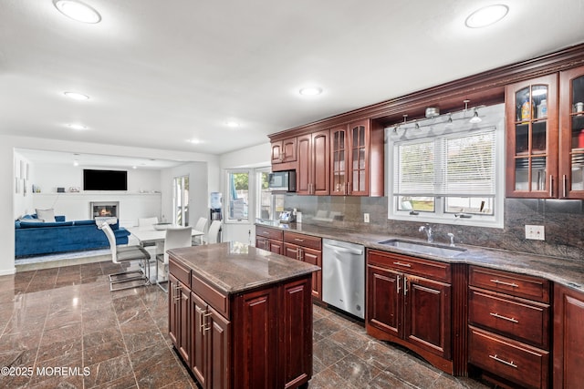 16 Bridle Dr, West Long Branch, NJ 07764 - kitchen with appliances with stainless steel finishes, a sink, healthy amount of natural light, decorative backsplash, and recessed lighting