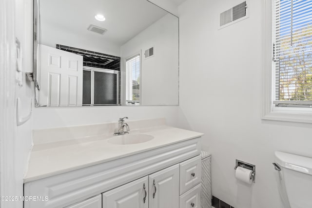 16 Bridle Dr, West Long Branch, NJ 07764 - full bathroom with toilet, a stall shower, and vanity