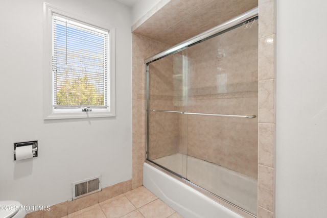 16 Bridle Dr, West Long Branch, NJ 07764 - full bath with tile patterned floors, shower / bath combination with glass door, and toilet