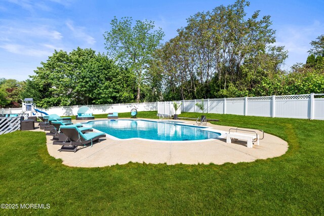 16 Bridle Dr, West Long Branch, NJ 07764 - view of pool with a patio area, a diving board, and view of scattered trees