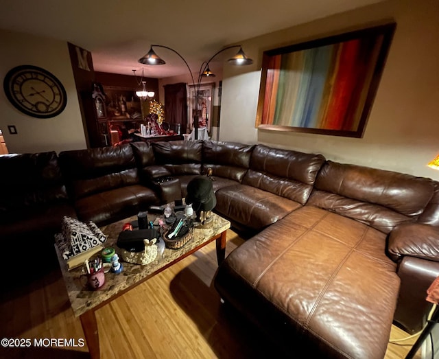 1108 Lilly Ln, Jackson, NJ 08527 - living area featuring wood finished floors and a chandelier