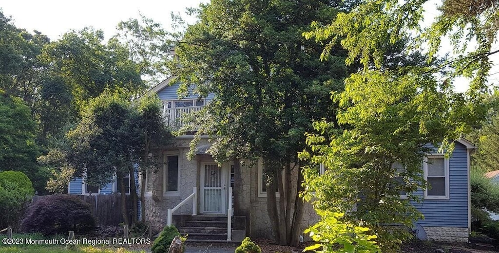 360 W Veterans Hwy, Jackson, NJ 08527 - obstructed view of property featuring stone siding