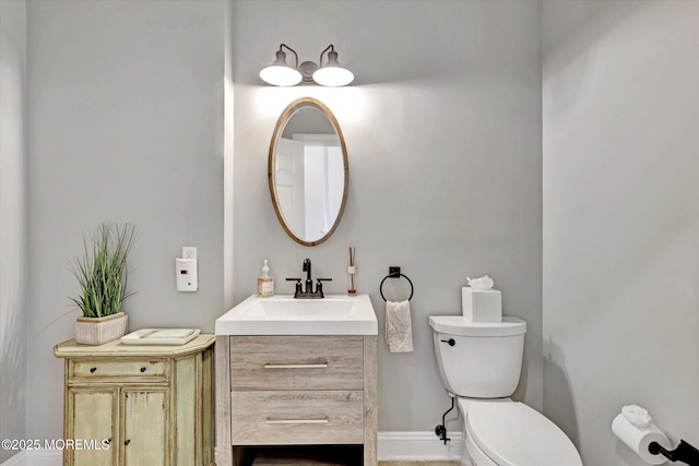 6 Tower Rd, Long Branch, NJ 07740 - half bathroom featuring toilet, vanity, and baseboards