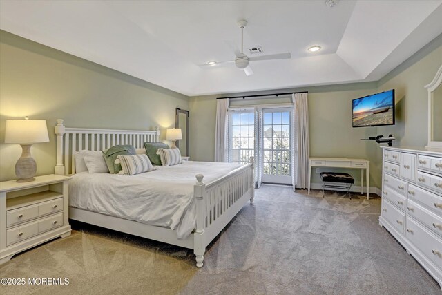6 Tower Rd, Long Branch, NJ 07740 - carpeted bedroom featuring a ceiling fan, a tray ceiling, and baseboards