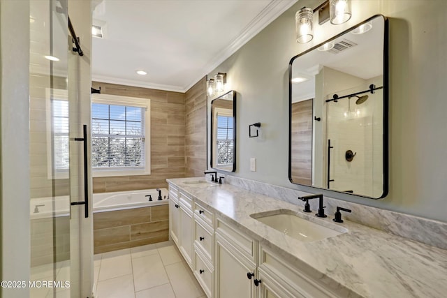 6 Tower Rd, Long Branch, NJ 07740 - bathroom featuring double vanity, a bath, a stall shower, ornamental molding, and tile patterned floors