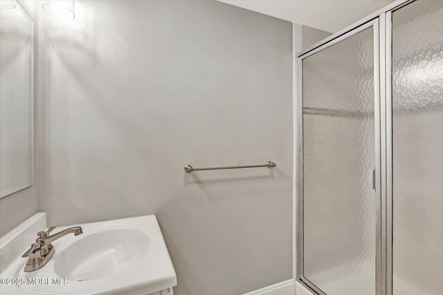 6 Tower Rd, Long Branch, NJ 07740 - full bathroom featuring a shower stall and vanity
