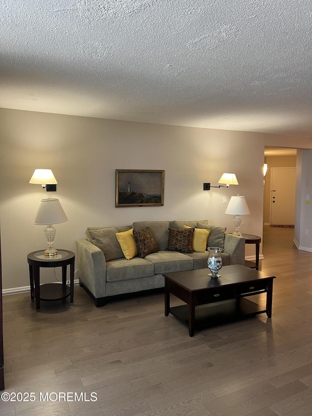 1 Channel Dr Unit 1203, Monmouth Beach, NJ 07750 - living room with wood finished floors, a textured ceiling, and baseboards