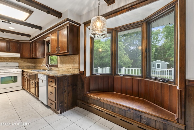 205 Edgemere Dr, Toms River, NJ 08755 - kitchen featuring white appliances, a sink, a chandelier, a baseboard heating unit, and light tile patterned floors