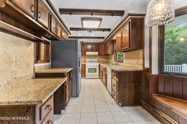 205 Edgemere Dr, Toms River, NJ 08755 - kitchen featuring white appliances, under cabinet range hood, a baseboard heating unit, a sink, and backsplash