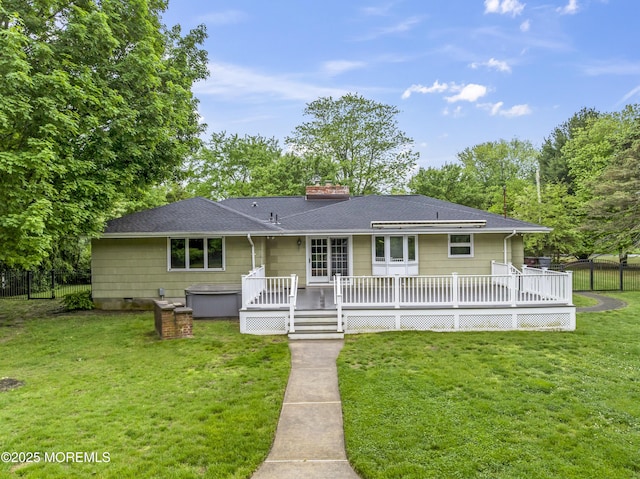 205 Edgemere Dr, Toms River, NJ 08755 - rear view of house featuring a jacuzzi, a chimney, a deck, and roof with shingles