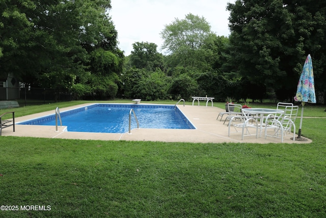 205 Edgemere Dr, Toms River, NJ 08755 - swimming pool with a patio area and a diving board