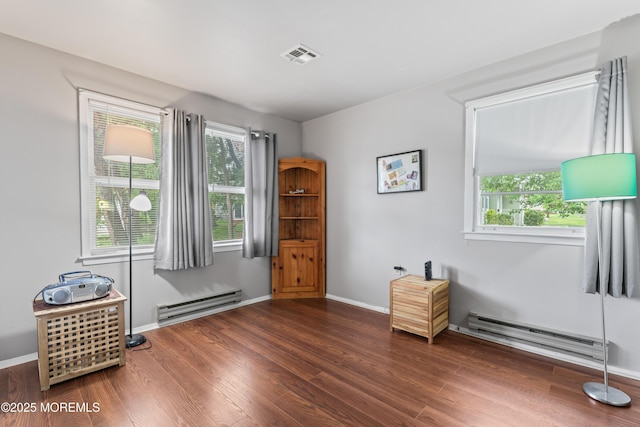 80 Falmouth Ave Unit 72, Whiting, NJ 08759 - misc room with baseboard heating, wood finished floors, and baseboards
