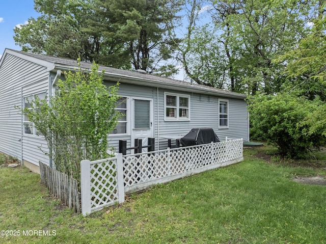 80 Falmouth Ave Unit 72, Whiting, NJ 08759 - rear view of house featuring a lawn