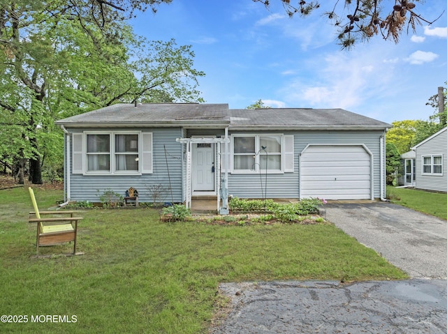 80 Falmouth Ave Unit 72, Whiting, NJ 08759 - view of front of property with a garage, a front yard, asphalt driveway, and a shingled roof