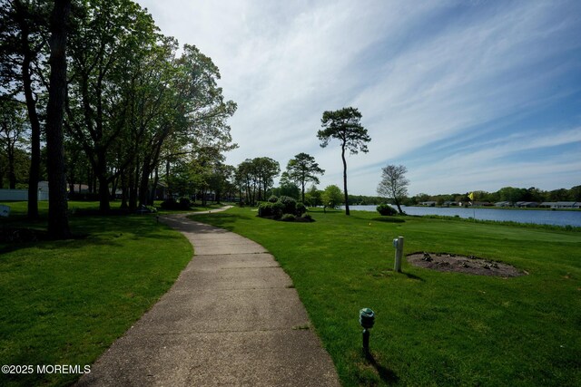 30F Cambridge Ct, Lakewood, NJ 08701 - view of property's community with a water view and a lawn