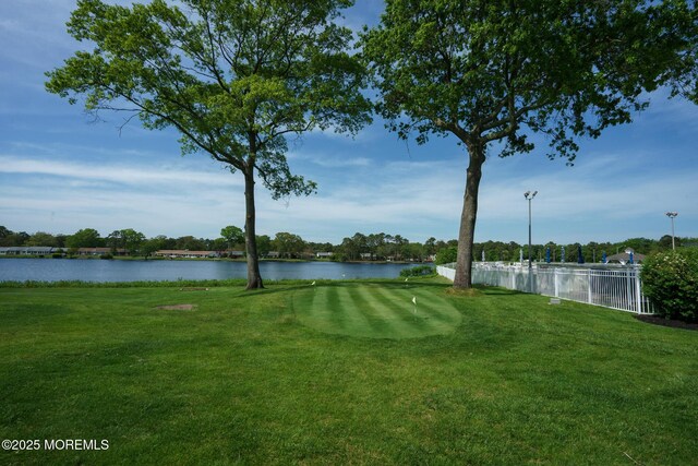 30F Cambridge Ct, Lakewood, NJ 08701 - view of yard featuring an area to practice putting and a water view