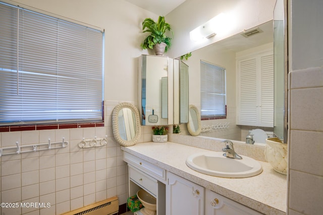 30F Cambridge Ct, Lakewood, NJ 08701 - bathroom featuring vanity and baseboard heating