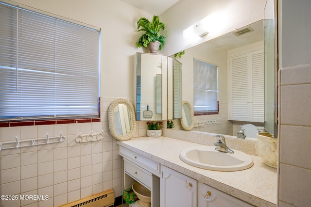 30F Cambridge Ct, Lakewood, NJ 08701 - bathroom with vanity and a baseboard heating unit