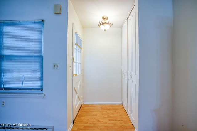 30F Cambridge Ct, Lakewood, NJ 08701 - hall featuring light wood-type flooring and baseboards