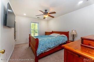 bedroom featuring baseboards, recessed lighting, light carpet, and a ceiling fan