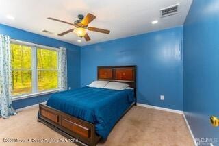 bedroom featuring baseboards, carpet, and a ceiling fan