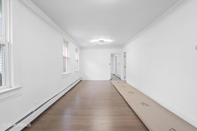 101 Forest Ave, Keansburg, NJ 07734 - hall featuring a baseboard heating unit, crown molding, wood finished floors, and baseboards