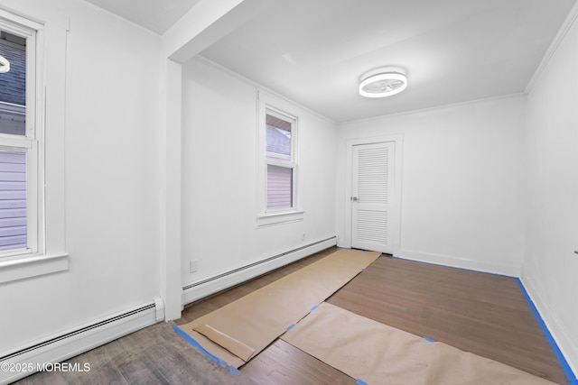 101 Forest Ave, Keansburg, NJ 07734 - empty room with baseboard heating and wood finished floors