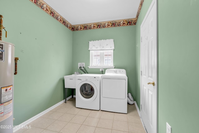 4 Saxony Cir, Manchester, NJ 08759 - laundry area featuring washing machine and clothes dryer, water heater, light tile patterned floors, and baseboards