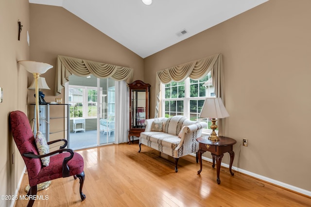 4 Saxony Cir, Manchester, NJ 08759 - sitting room featuring plenty of natural light, lofted ceiling, wood finished floors, and baseboards