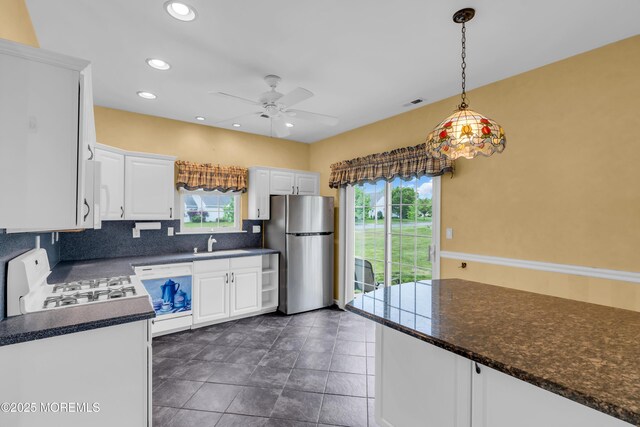 4 Saxony Cir, Manchester, NJ 08759 - kitchen with freestanding refrigerator, stove, healthy amount of natural light, ceiling fan, and recessed lighting