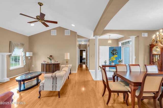 4 Saxony Cir, Manchester, NJ 08759 - living room with decorative columns, arched walkways, ceiling fan, light wood-type flooring, and vaulted ceiling