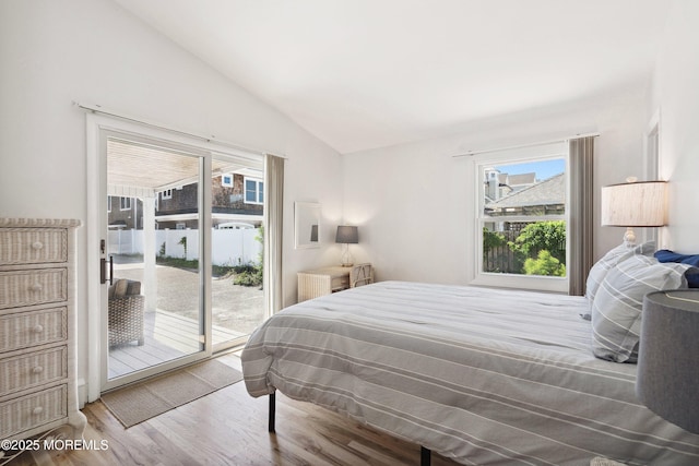 1316 Ocean Ave, Point Pleasant Beach, NJ 08742 - bedroom with access to outside, vaulted ceiling, wood finished floors, and multiple windows