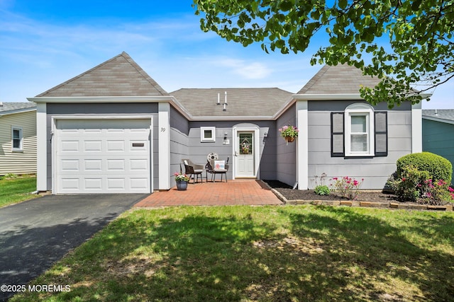 39 Patmore Rd, Brick, NJ 08724 - ranch-style home with asphalt driveway, roof with shingles, a garage, and a front yard