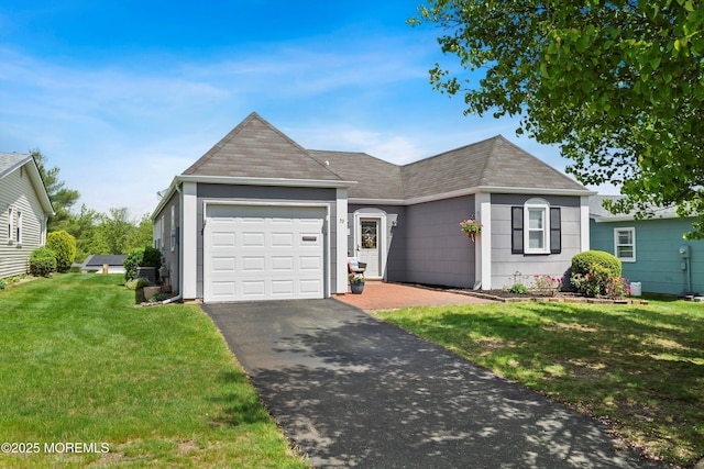 39 Patmore Rd, Brick, NJ 08724 - ranch-style house featuring an attached garage, asphalt driveway, a shingled roof, and a front lawn