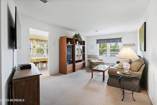 39 Patmore Rd, Brick, NJ 08724 - living area featuring light carpet and a baseboard heating unit