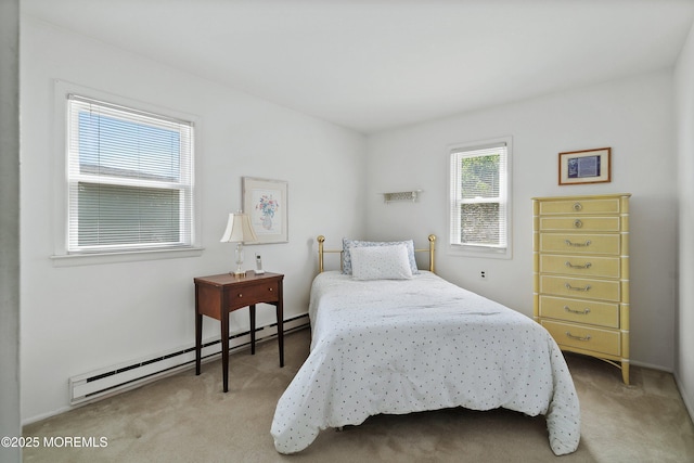 39 Patmore Rd, Brick, NJ 08724 - bedroom featuring a baseboard heating unit and light colored carpet