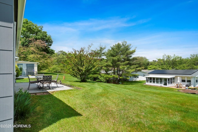 39 Patmore Rd, Brick, NJ 08724 - view of green lawn featuring a patio