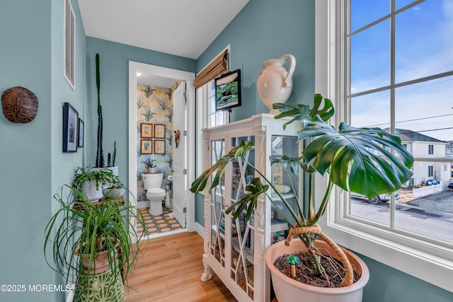 1709 Certainty Dr, Point Pleasant, NJ 08742 - corridor featuring plenty of natural light, wood finished floors, and baseboards