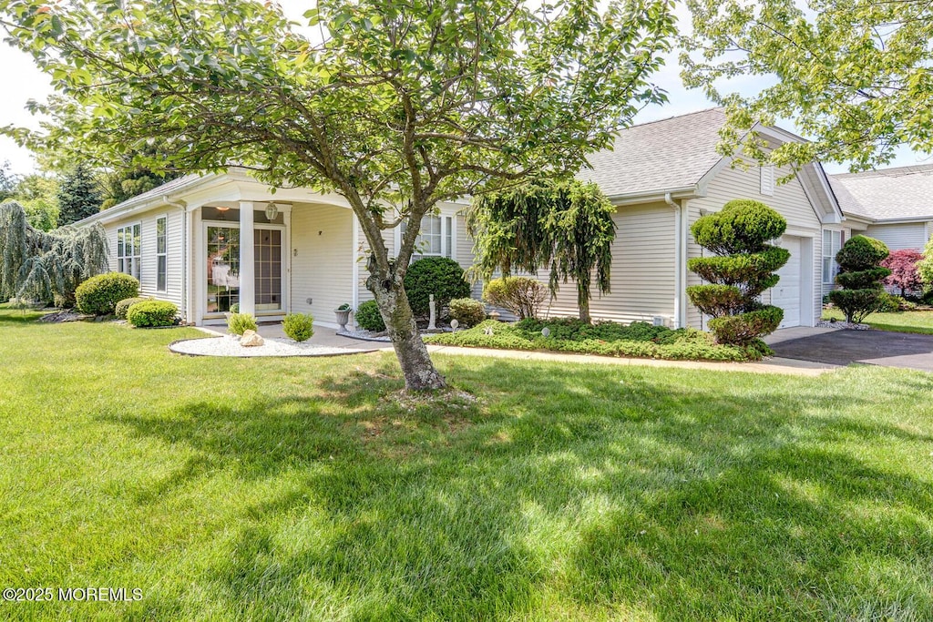 18 Quicksilver Ct, Lakewood, NJ 08701 - obstructed view of property with driveway, a garage, a front yard, and a shingled roof